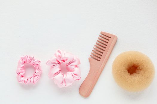 wooden Hairbrush, barrette and silk Pink Scrunchy isolated on white. Flat lay Hairdressing tools and accessoriesas Color Hair Scrunchies, Elastic Hair Bands, Bobble Sports Scrunchie Hairband