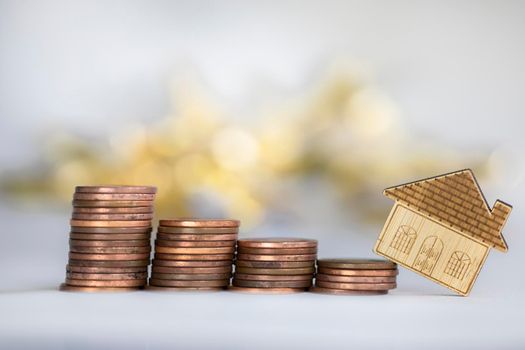 coins saving setting stairs up to house model for concept investment mortgage loan finance and business climbing stairs