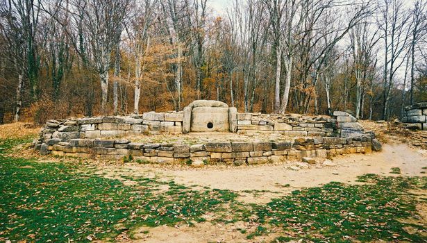 Ancient stone dolmen in the river valley Zhane, town Gelendzhik, North Western Caucasus, Russia