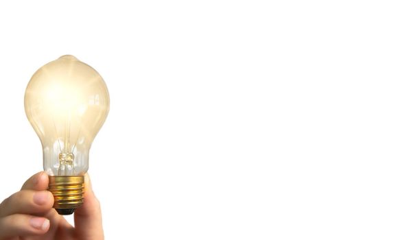 Hand holding glowing light bulb,finding innovative solutions and creative ideas, being unique, thinking different concept isolated on white background, copy space space for text