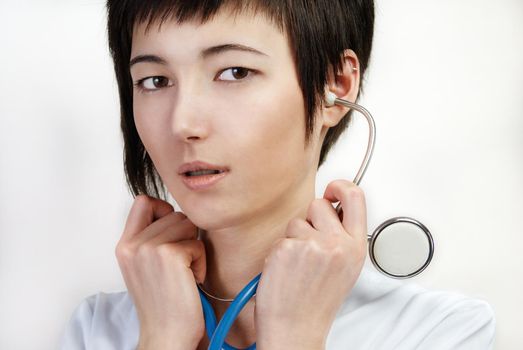 portrait of young woman in medical gown