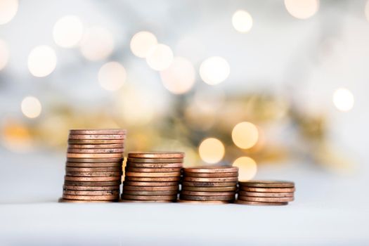 Stack of coins, money climbing stairs with bokeh background, Finance and saving concept with copy space growing business