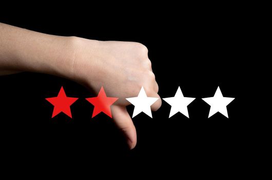 Bad review, Thumb down with red stars for bad service dislike bad quality, Customer experience, rating, social media concept background copy space