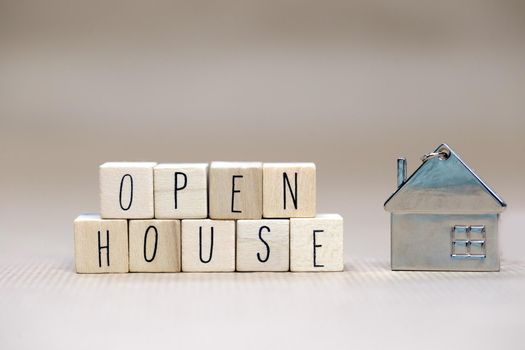 open house sign text wooden cubes, real estate, mortgage,business and sale concept background with symbol of house copy space