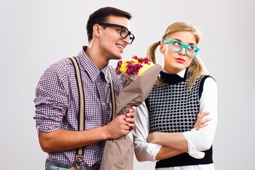 Nerdy man wants  that her nerdy girlfriend forgive him because of something.