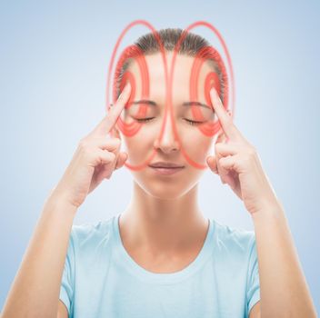Young woman touches her head, the temporal region of red color, concept of headache