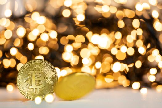 Golden bitcoin with yellow bokeh background. Cryptocurrency concept. Blockchain and digital crypto currency exchange concept. space for text copy space