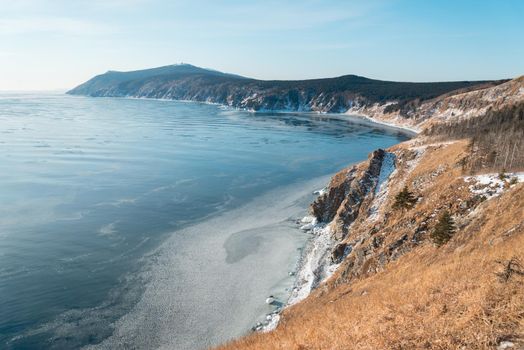 The blue sea and the mountain in winter