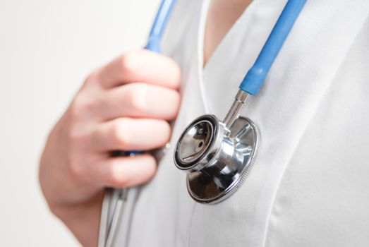 Female doctor hold stethoscope