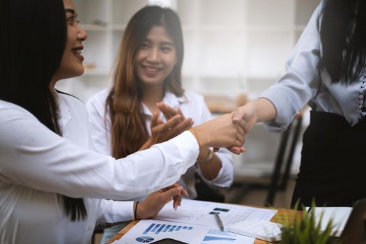 Business partnership meeting concept. Image businessmans handshake. Successful businessmen handshaking after good deal. Group support concept