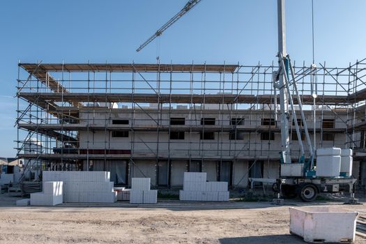 construction site of new Dutch Suburban area with modern family houses, newly build modern family homes in the Netherlands Construction site of local homes, the Construction site of local family houseNetherlands