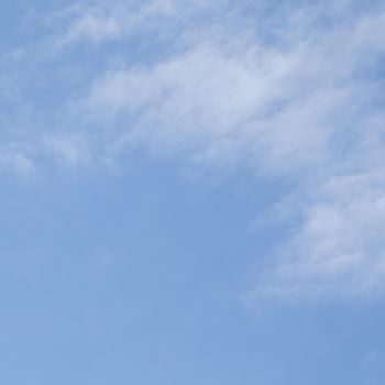 Background of blue sky with white clouds.