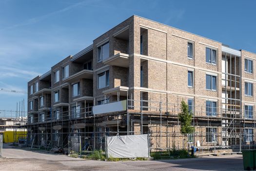 construction site of new Dutch Suburban area with modern family houses, newly build modern family homes in the Netherlands Construction site of local homes, the Construction site of local family houseNetherlands