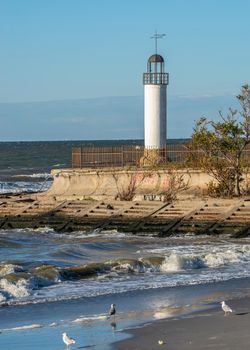 Old Lighthouse Karabush in the resort village of Morskoe near Odessa, Ukraine, on a sunny spring day