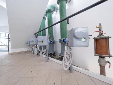 Pumping equipment or system, water supply.  Tile floor in the room, the lower part of the floor stairs