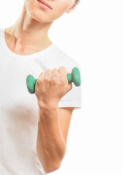 Unrecognizable woman is holding dumbbell, space for text