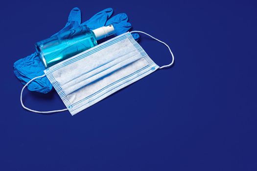 Face mask, medical gloves and sanitizer. Coronavirus covid-19 prevention concept