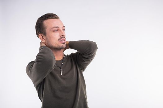 Elegant young handsome man. Studio fashion portrait.