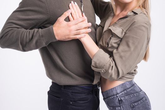 Beauty couple dancing social dance. Kizomba or bachata or semba or taraxia , on white background.