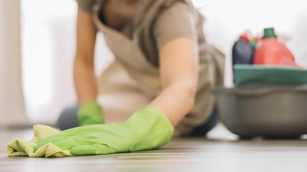 close up woman cleaning floor (1)