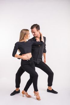 Salsa, kizomba and bachata dancers on white background. Social dance.