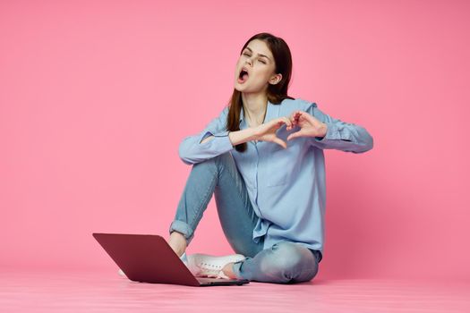 student laptop education internet pink technology background. High quality photo