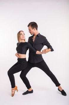 Salsa, kizomba and bachata dancers on white background. Social dance.