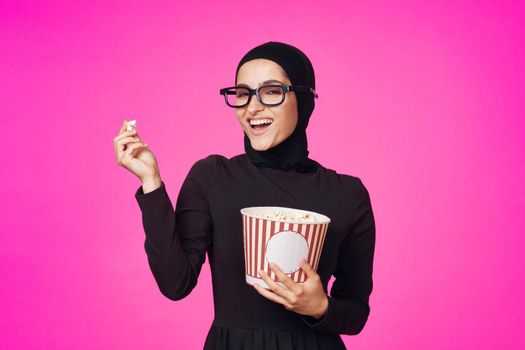 cheerful woman attractive look popcorn glasses movie watching isolated background. High quality photo