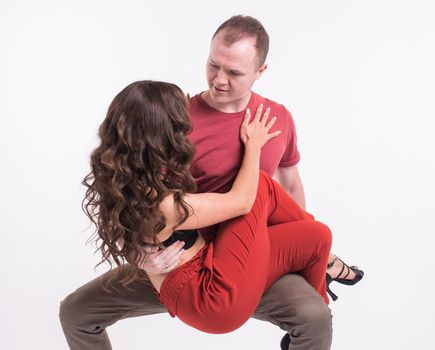 Beauty couple dancing social dance. Kizomba or bachata or semba or taraxia , on white background.