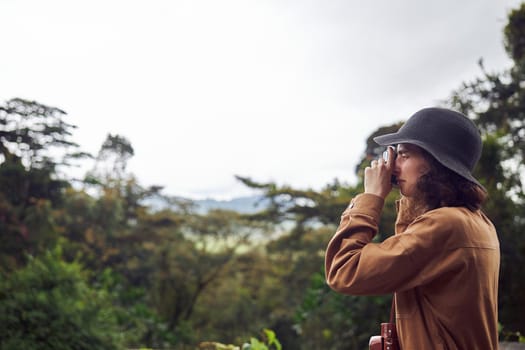 Beautiful young female caucasian tourist in equatorial africa jungles