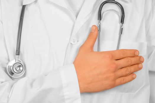 Doctor is stroking his pocket with money, concept of bribery