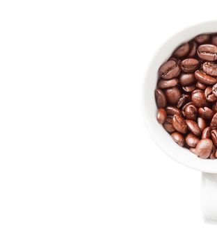 Close-up mug with coffee beans in white background