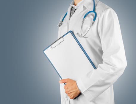 Unrecognizable man doctor holding a clipboard, copyspace