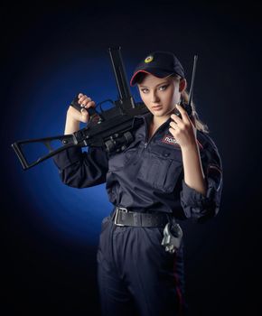 girl in the police uniform with a gun is a Russian policeman. English translation of Police