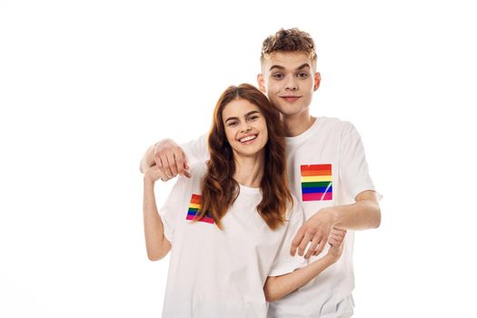 young couple lgbt Flag transgender lifestyle light background. High quality photo