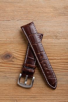 closeup brown crocodile grain leather watch band