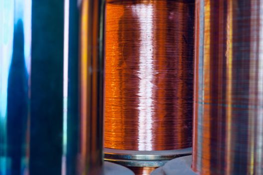 Production of copper wire, cable in reels at factory. Cable factory. Close up.