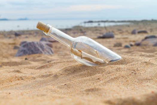 Bottle with a message on the beach