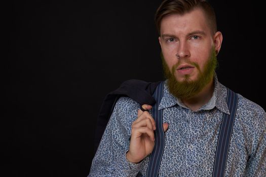 business man in shirt with jacket over his shoulders posing self confidence. High quality photo