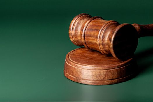 Wooden judges gavel on table