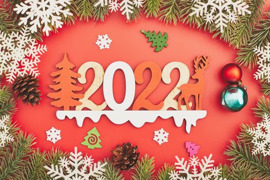 Christmas minimalism holidays composition on red background with copy space for your text 2022