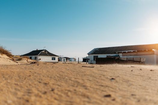 Village: residential houses in the sandy area.