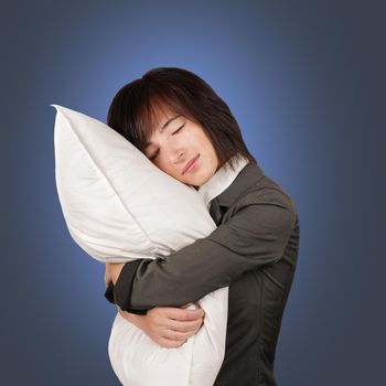 Young tired businesswoman sleeping on a pillow