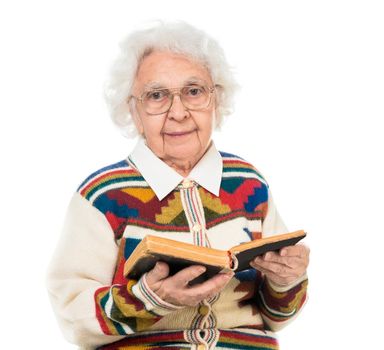 elderly woman flipping an old book isoalted on white background