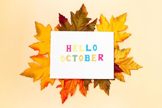 Great season texture with fall mood. Nature september and october background with hand lettering Hello October.