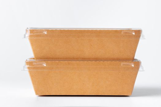 Cardboard brown food box pack isolated on white background close up