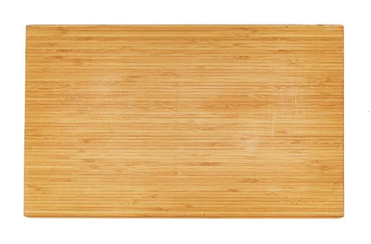 Wooden cutting board on a white background, close up