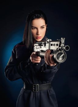 the Portrait of a woman in a Russian police uniform with a rifle English translation police