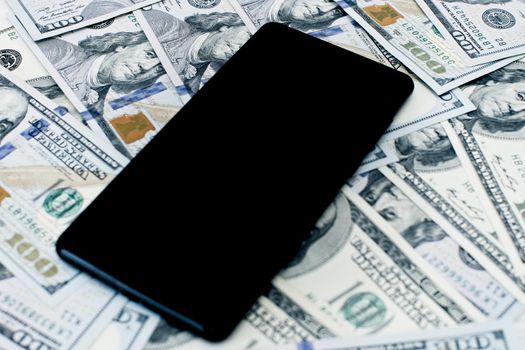The phone is on the money . Money investment via phone, mobile payments. Phone in dollars .