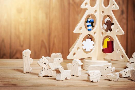 cute wooden toy animal on wood board, tiny toys and shallow depth of field